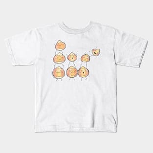 Eight hazelnuts balancing Kids T-Shirt